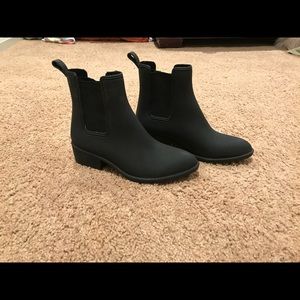 Black silicone horseback riding boots